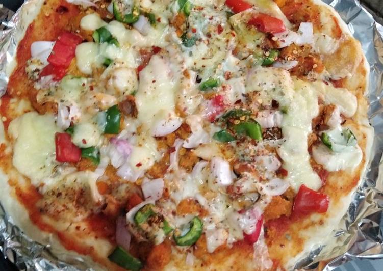 Step-by-Step Guide to Prepare Homemade Chicken Tikka pizza