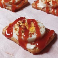A picture of Tuc Egg Canapes.
