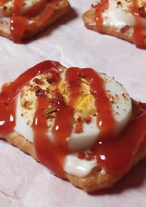 A picture of Tuc Egg Canapes.