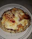 Pizzeta rellena con tapa de empanada