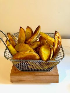 Una foto de Patatas al horno (sin aceite!)
