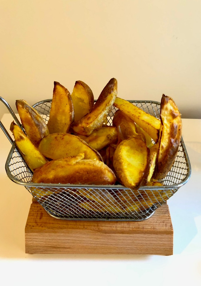 Una foto de Patatas al horno (sin aceite!)