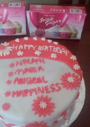 A picture of Vanilla cake with fondant icing.