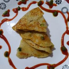 A picture of Crispy potato cheela.