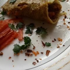 A picture of Egg wrap/egg roll.