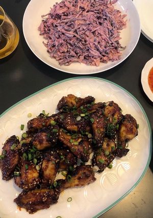 A picture of Sweet & sticky wings with classic slaw.