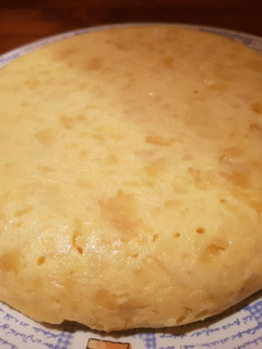 Una foto de Tortilla de patata de jamón y queso