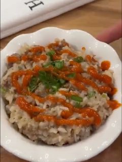 A picture of Beef Rice Bowl with Rice Cooker.