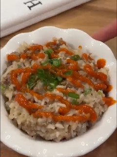 A picture of Beef Rice Bowl with Rice Cooker.