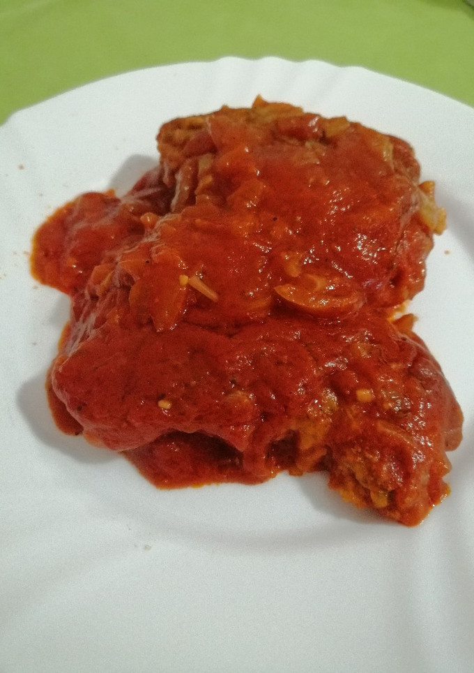 Una foto de Bacalao con tomate