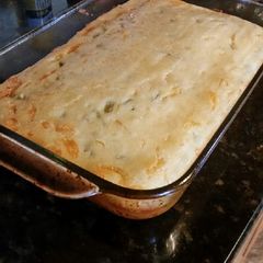 A picture of Brad's cornbread with cheddar, green chile, and honey.