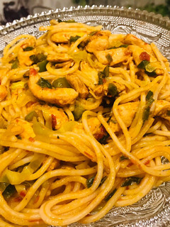 A picture of Spaghetti with tomato sauce.