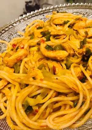 A picture of Spaghetti with tomato sauce.