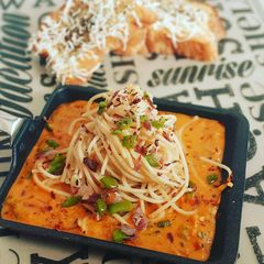 Garlic burnt Spaghetti with red sauce A picture of Garlic burnt Spaghetti with red sauce.