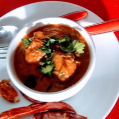 A picture of Paneer in red curry.