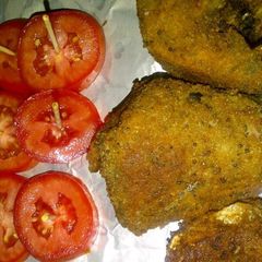 A picture of Floured fried titus fish.