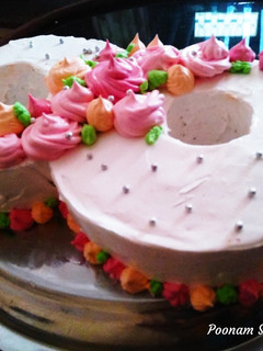 A picture of 8 digit  Anniversary cake.
