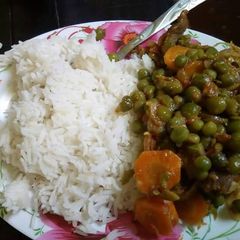 Beef stew and rice A picture of Beef stew and rice.