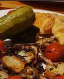 Pollo frito apanado con verduras al horno