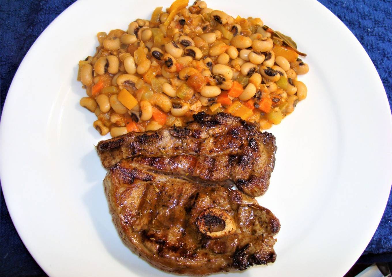 Braised Cajun Lamb and Black-Eyed Peas. Belt style