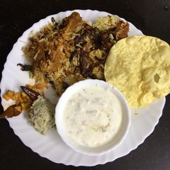A picture of Chicken Dum biryani.