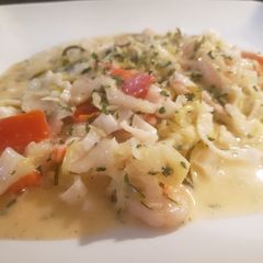 A picture of Seafood zucchini pasta w/fresh creamy sauce.