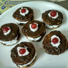 A picture of Homemade chocolate cream biscuits.