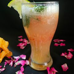 A picture of Sweet lime plum mojito.