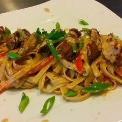 A picture of Bianco Meats -" Raging Fettucine, with Cajun Marinated Chicken.