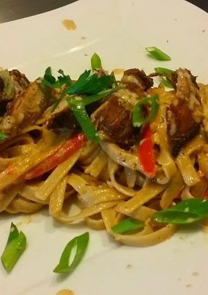 A picture of Bianco Meats -" Raging Fettucine, with Cajun Marinated Chicken.
