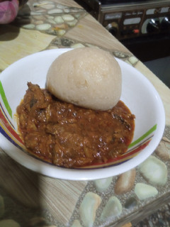 A picture of Eba with Fish sauce.