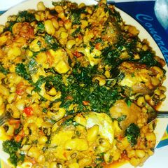 A picture of Porriage beans with fish and vegetable.