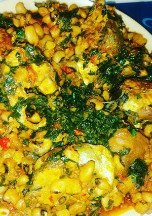A picture of Porriage beans with fish and vegetable.