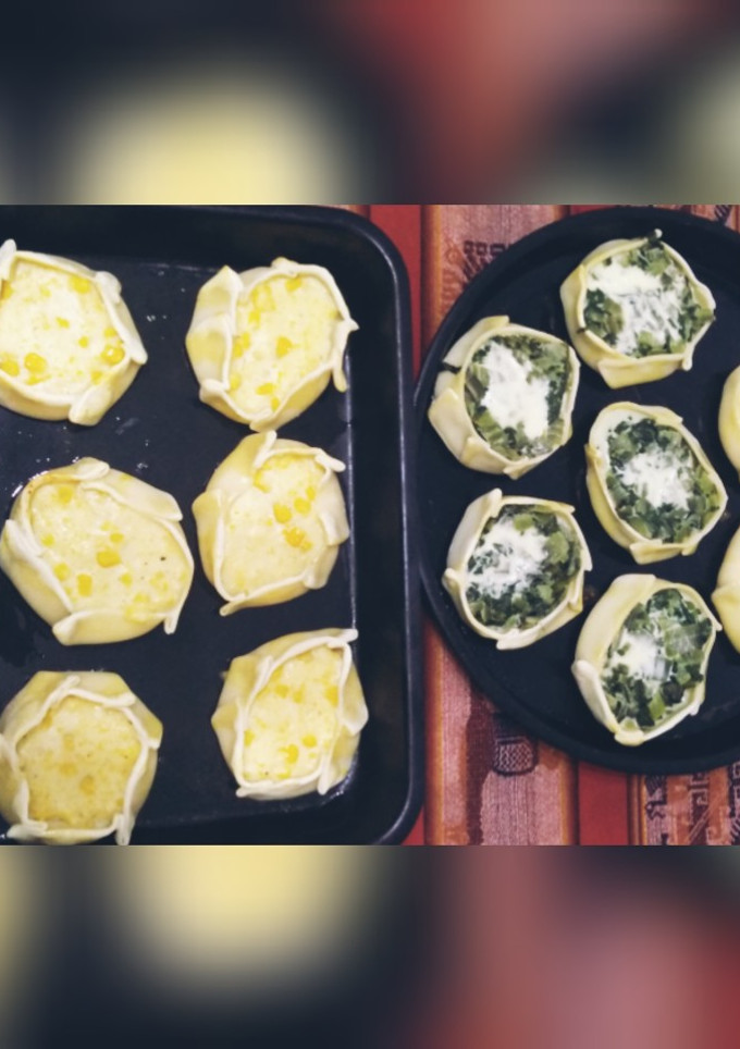 Una foto de "Canastitas de choclo y acelga con salsa blanca"