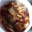 Ravioles con salsa roja de pollo