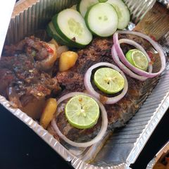 A picture of Grilled fish with potato sauce.