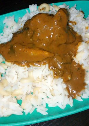 A picture of Rice and macaroni with banga soup.