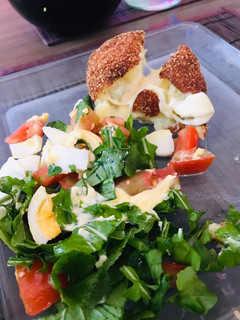 Una foto de Bombas de papas rellenas de muzzarella