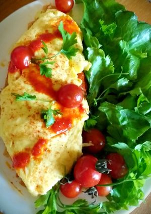 Une photo de Omurice une omelette aux riz