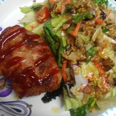 A picture of Chicken and Salad.