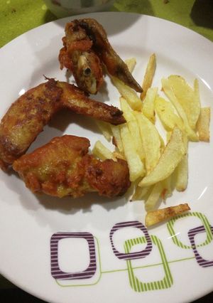 Una foto de Alitas en salsa picante