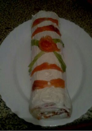 Foto principal de Brazo de pan de molde relleno de cóctel de marisco
