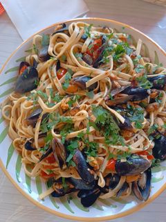 Foto di Fettuccine fresche con le cozze e pomodorini