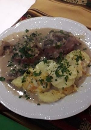 Una foto de Lomo al Champiñón