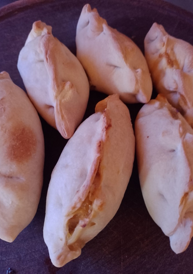 Una foto de Empanaditas de atún y cebollas al horno