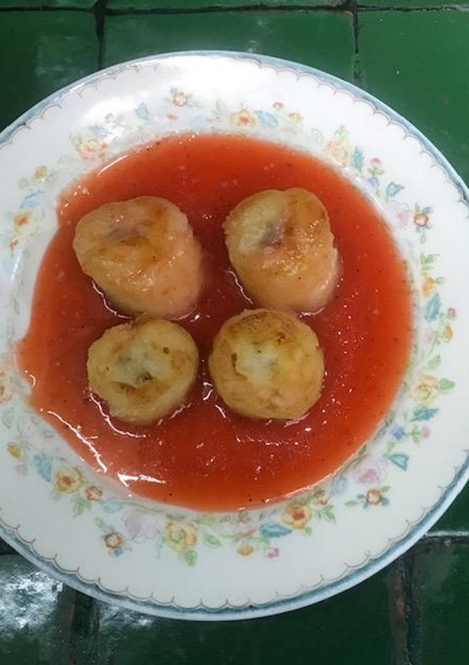 Una foto de Plátanos con salsa de fresas
