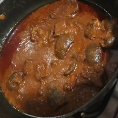 A picture of Tomato stew with pomo.