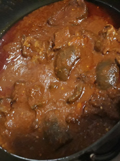 A picture of Tomato stew with pomo.