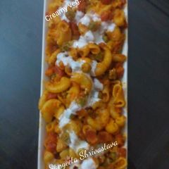 A picture of Cheesy veg. macroni pasta.