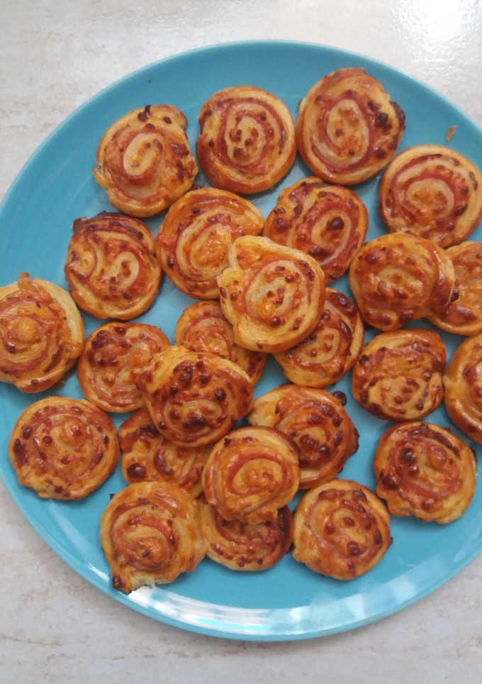 Una foto de Rollitos de jamón y queso